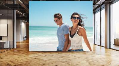 Young couple enjoy summer vacation Wall mural