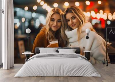 photo of two young blond hair girls holding beer glass Wall mural