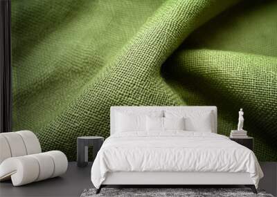 Green textile with tightly woven texture, robust and durable material in an uniform neutral color suitable for various design contexts such as upholstery, carpets and curtains or heavy-duty garments Wall mural