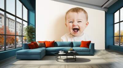 Baby with flu laughing Wall mural