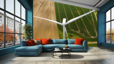 aerial view of a wind turbine in a agriculture field Wall mural