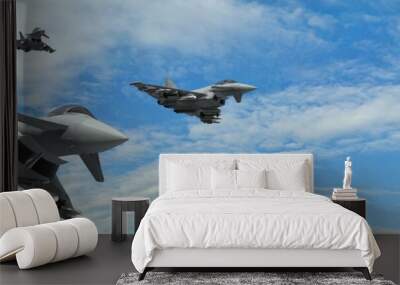 military fighter jets - modern armed military fighter jets flys in formation Wall mural