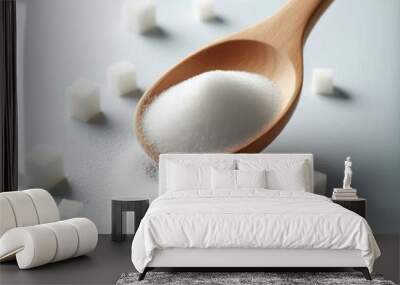 Spoon Adding Sugar on White Background, Clean and Simple Wall mural