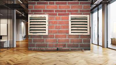 A brick wall with two vents Wall mural