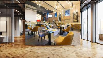 Interior of a modern hotel restaurant with brick wall Wall mural