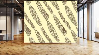 a pattern from a baguette. seamless pattern of a long yellow baguette drawn in doodle style randomly arranged on a beige background for a bakery template Wall mural