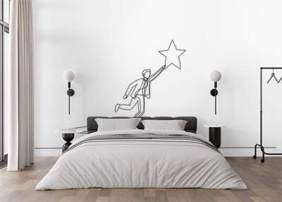 Drawing of businessman bounce on trampoline jump flying high to grab star. Metaphor for achievement. Continuous line art style Wall mural