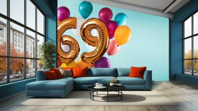 Banner with number 69 colorful balloons with copy space Wall mural