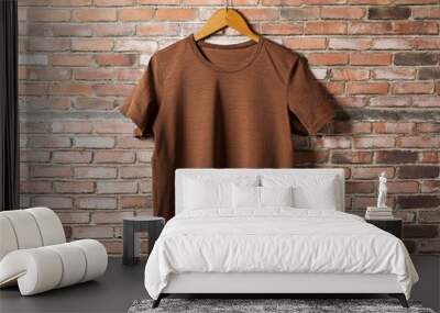 Brown t-tshirt hanging against vintage brick wall Wall mural