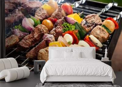 Skewers with meat and vegetables shashlik on a grill Wall mural