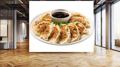 Pan-fried gyoza with dipping sauce on a white plate, isolated on white or transparent background. Wall mural