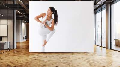 Beautiful young woman doing yoga Wall mural