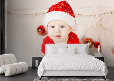 small child, baby lies on his stomach and smiles. On a white background. Newborn baby. three months old baby. A baby of European appearance. selective focus Wall mural