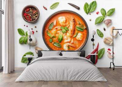 A delicious bowl of spicy shrimp curry, garnished with herbs and chili. Wall mural