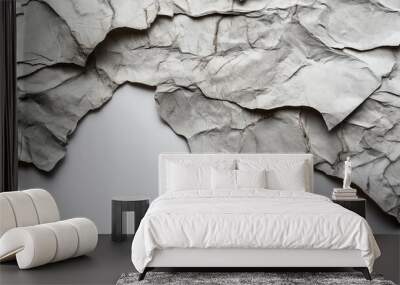 Soft gray crumpled paper evokes a sense of aged simplicity and texture. Wall mural