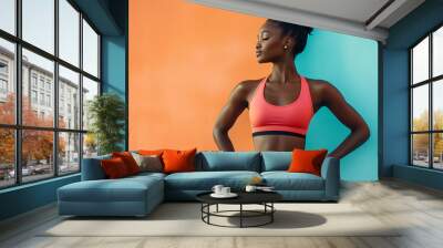 A young woman confidently showcases her beautiful slim figure, highlighting grace, fitness, and body positivity. Wall mural