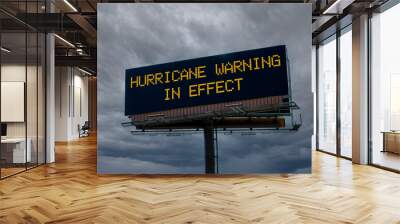 Electronic highway billboard with hurricane warning in effect message Wall mural