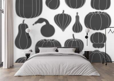 Set of black and white silhouettes with pumpkins of different shapes. Isolated vector objects on white background. Wall mural