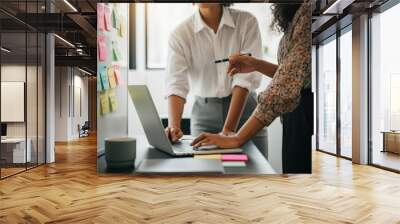 Women Working Together on a Laptop Wall mural