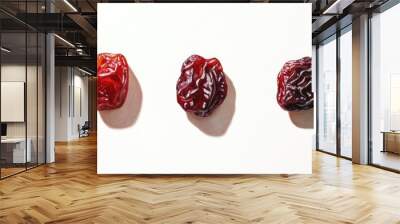 Oil painting depicting a trio of raisins from lingonberry and strawberry fruit tea captured in a macro perspective on a white background Wall mural