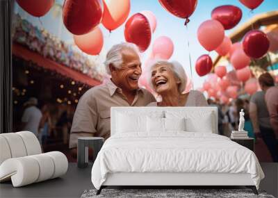 happy smiling senior couple at the amusement park Wall mural