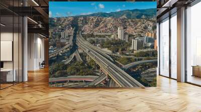 CARACAS, VENEZUELA - MAY 2022 - Aerial panoramic view of the La Arana distributor, Panoramic View of Francisco Fajardo highway in Caracas, Venezuela Wall mural