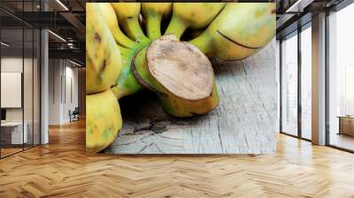 Banana ripe on the old wooden. Wall mural