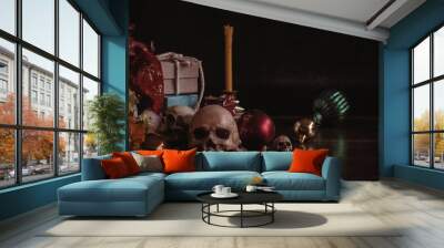 Skull and gifts on wooden. Wall mural