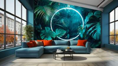 Circle made of blus neon light on green jungle leaves background Wall mural