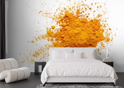 Turmeric scattered powder pile isolated on white, top view Wall mural