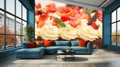 Deliciously rich cake brownie slice with Chantilly cream and fresh strawberry. Wall mural