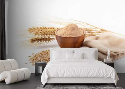 Spelt bran and grains with ears of wheat isolated on white background Wall mural