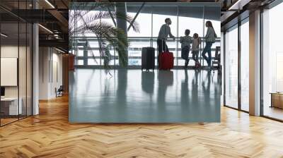 Family and children in the airport travel together Wall mural