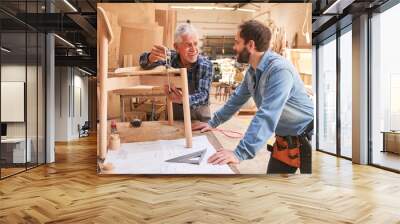 Senior craftsman works on a chair Wall mural