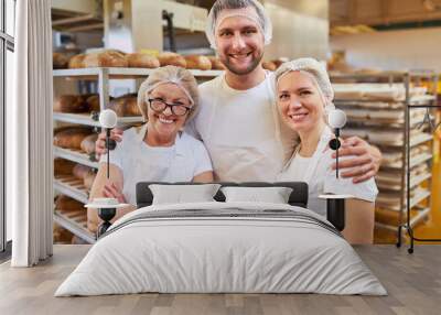 Successful bakery team with boss and apprentices Wall mural