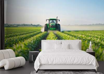 Tractor spraying pesticides in a lush green corn field on a sunny day, showcasing modern agricultural practices and technology for effective crop management. Wall mural