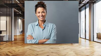 Turkish businesswoman in 40s, brown hair, copy space Wall mural