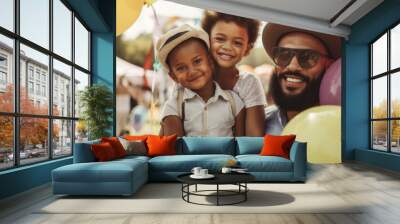 Young father with children at summer event Wall mural