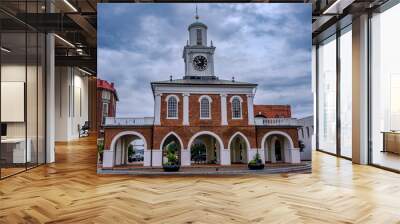 Market house full view with stormy cloud background empty streets Wall mural