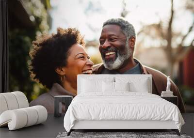 middle age african american couple laughing Wall mural