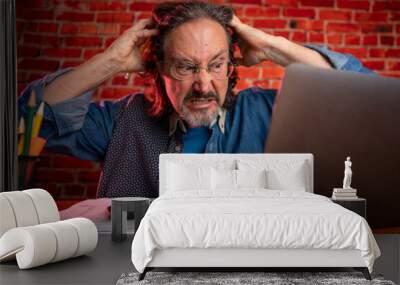 Funny portrait of angry man feel depressed doing tax prep to balance budget getting debt deficit finding mistake in calculations. Annoyed male count business costs on bankruptcy risk Wall mural