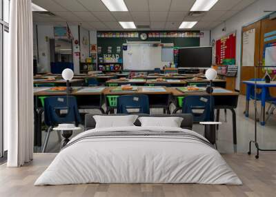 Wide angle view of empty elementary school classroom in the US. Wall mural