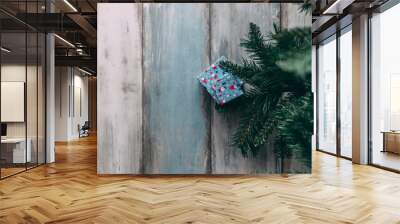 Gift  boxes under Christmas tree, flat lay with copy space left Wall mural