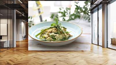 risotto with spinach and green asparagus. appetizing dish Wall mural