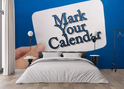 Speech bubble in front of colored background with Mark Your Calendar text. Wall mural