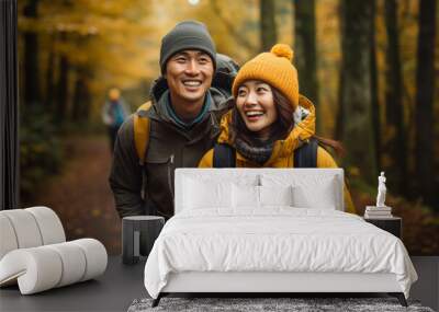 young asian couple hiking in the fall Wall mural