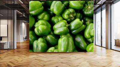 Indian Green Bell Peppers, view above several freshly harvested raw bell peppers, farmers market in Rajasthan, India Wall mural