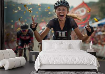 Professional female road cyclist celebrating the tour win - big crowd and gold confetti Wall mural