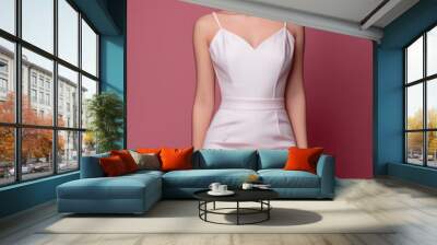 studio portrait of a woman model with pink short hair wearing a low-cut white dress on pink background, fashion photography Wall mural