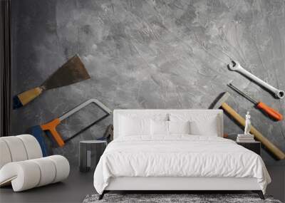 All tools supplies home construction on the gray wooden background. Building tool repair equipments,copy space,industry engineer tool concept.still-life. Wall mural